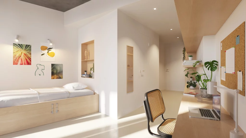 Premium student room at Hoso Tower with bed, desk, and modern furnishings