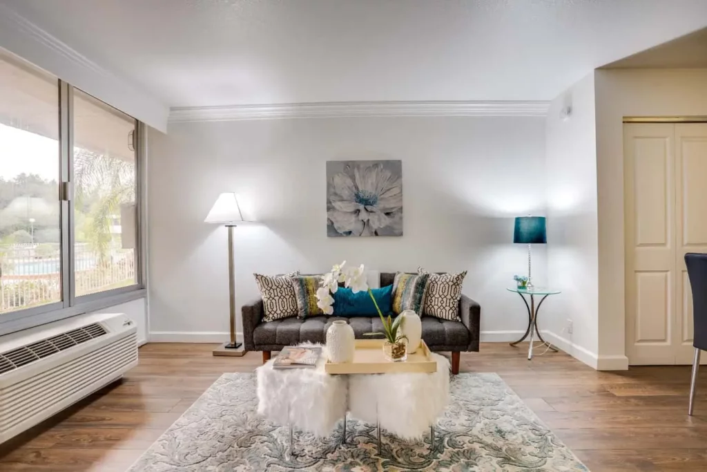 Interior photo of Maingate Village living room with modern furnishings and natural light