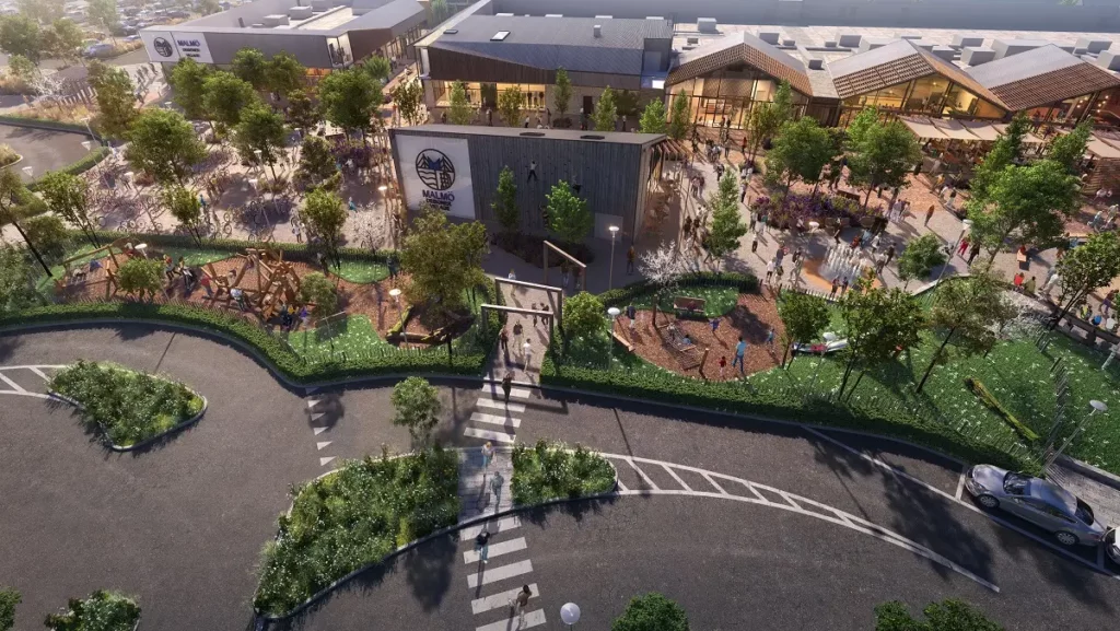 Aerial CGI render of Malmö Designer Outlet Village entrance showing overall site layout