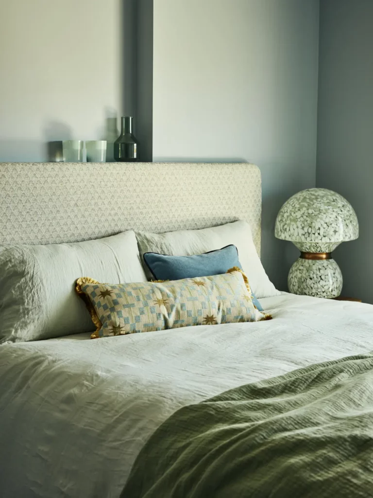 Furnished guestroom at Southall co-living residence with bed and workspace